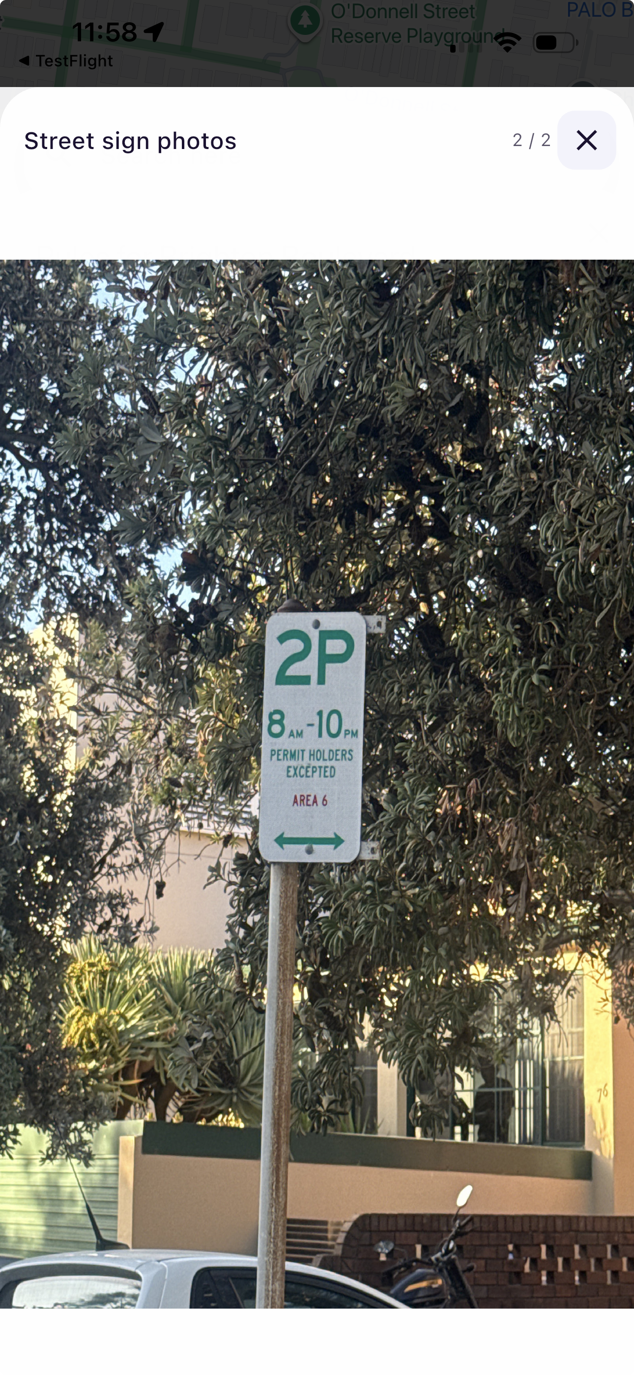 Premo app showing street sign verification photos